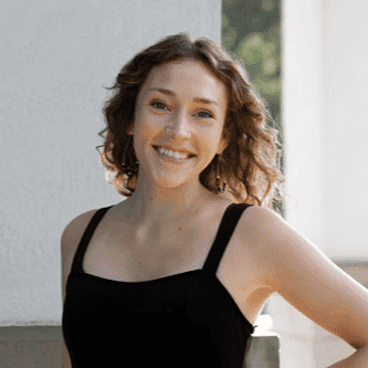 Portrait of Olivia J., a professional stylist at First Impressions Salon & Spa, showcasing their expertise and style.