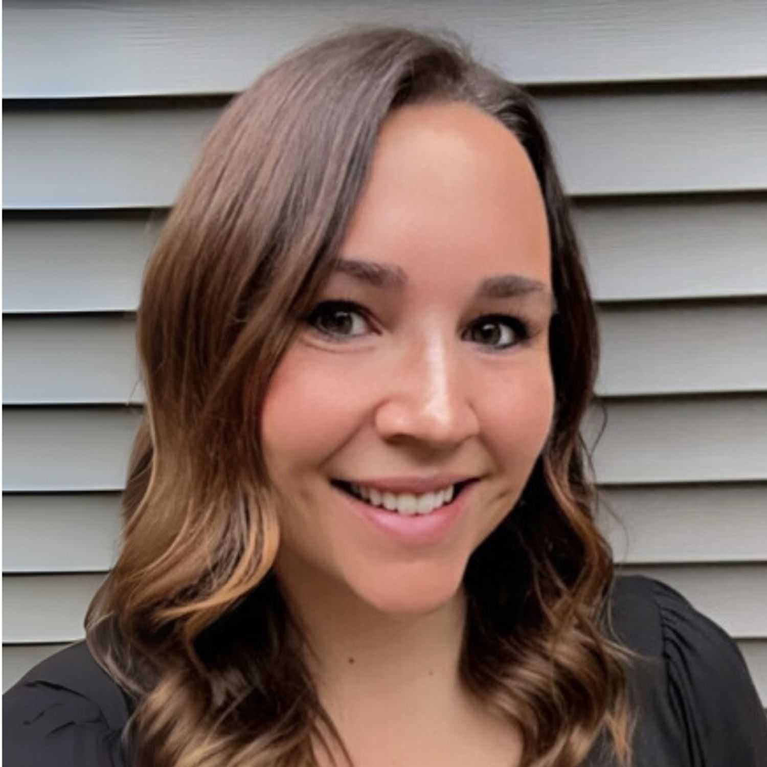 Portrait of Kailyn S., a professional stylist at First Impressions Salon & Spa, showcasing their expertise and style.