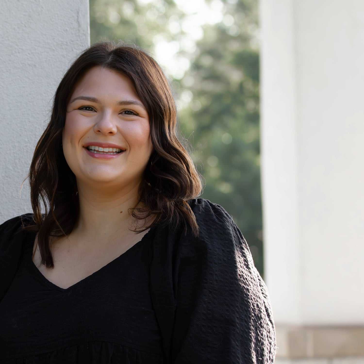 Portrait of Deanne O., a professional stylist at First Impressions Salon & Spa, showcasing their expertise and style.