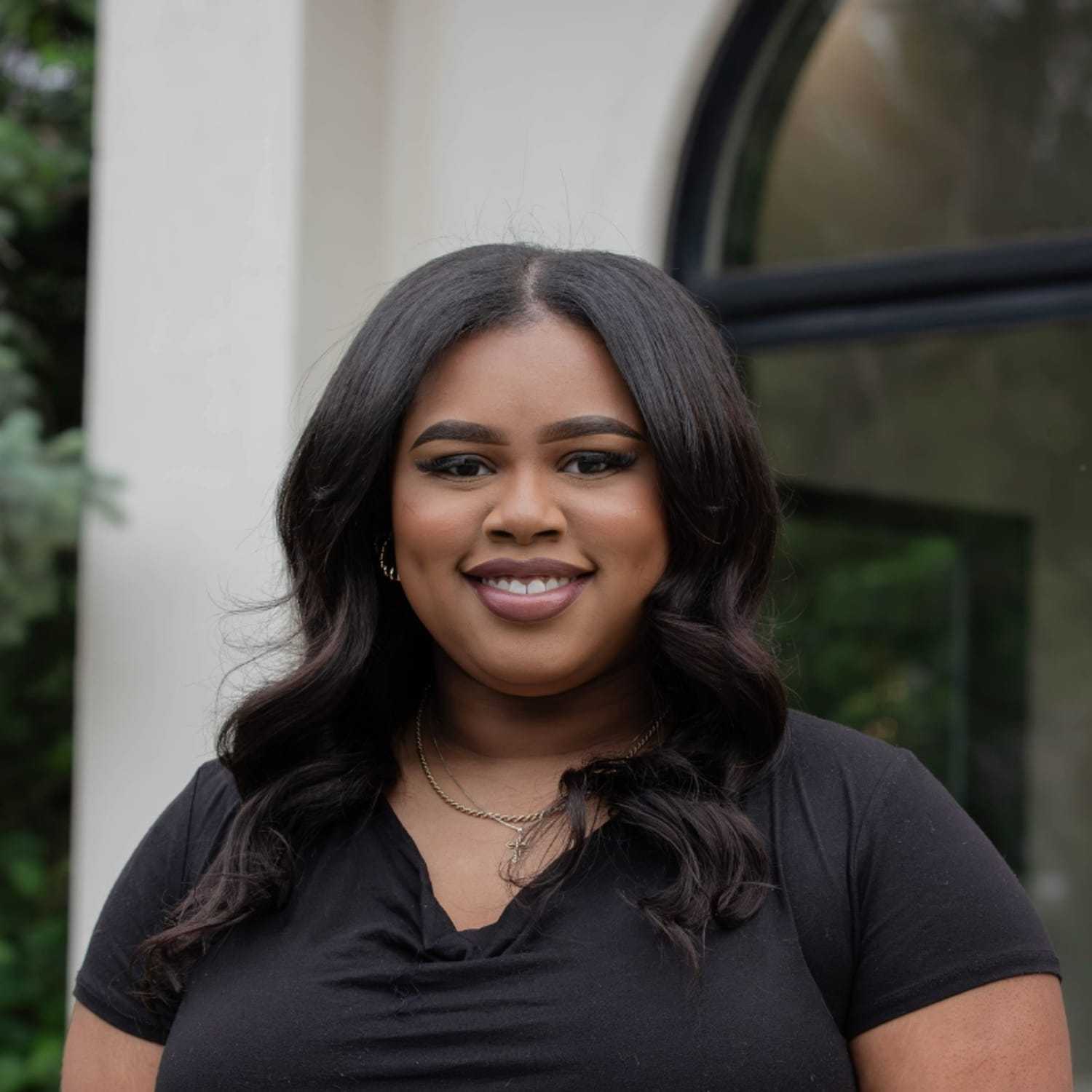 Portrait of Ashlyn A., a professional stylist at First Impressions Salon & Spa, showcasing their expertise and style.