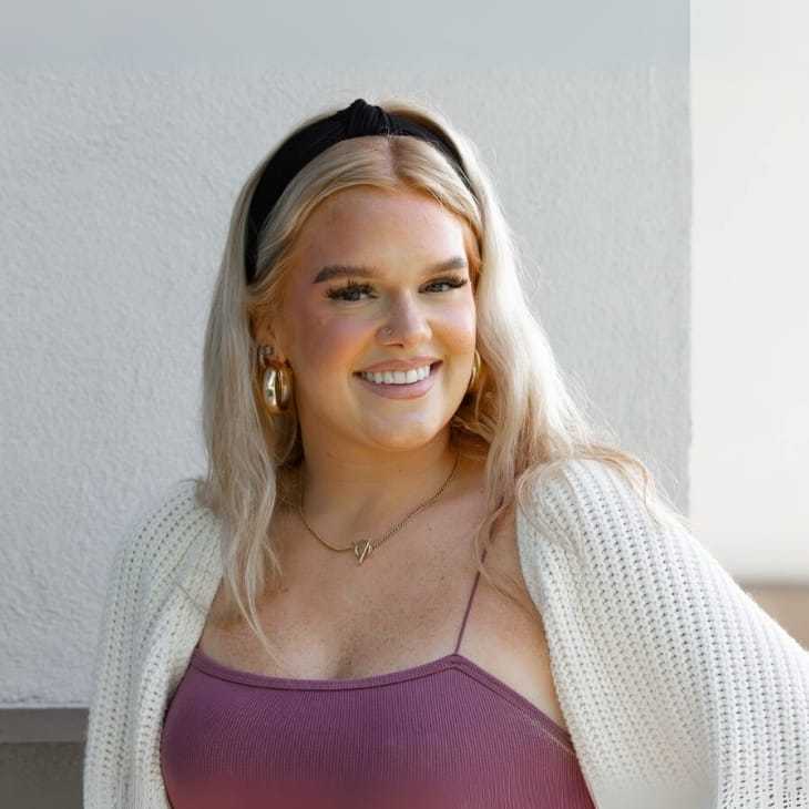 Portrait of Peyton C., a professional stylist at First Impressions Salon & Spa, showcasing their expertise and style.