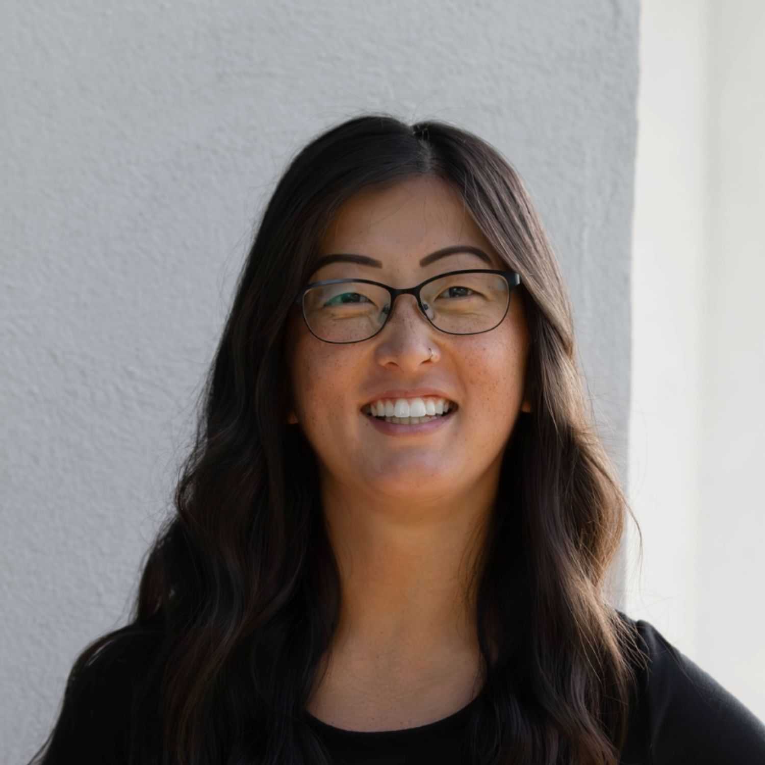 Portrait of Hannah N., a professional stylist at First Impressions Salon & Spa, showcasing their expertise and style.