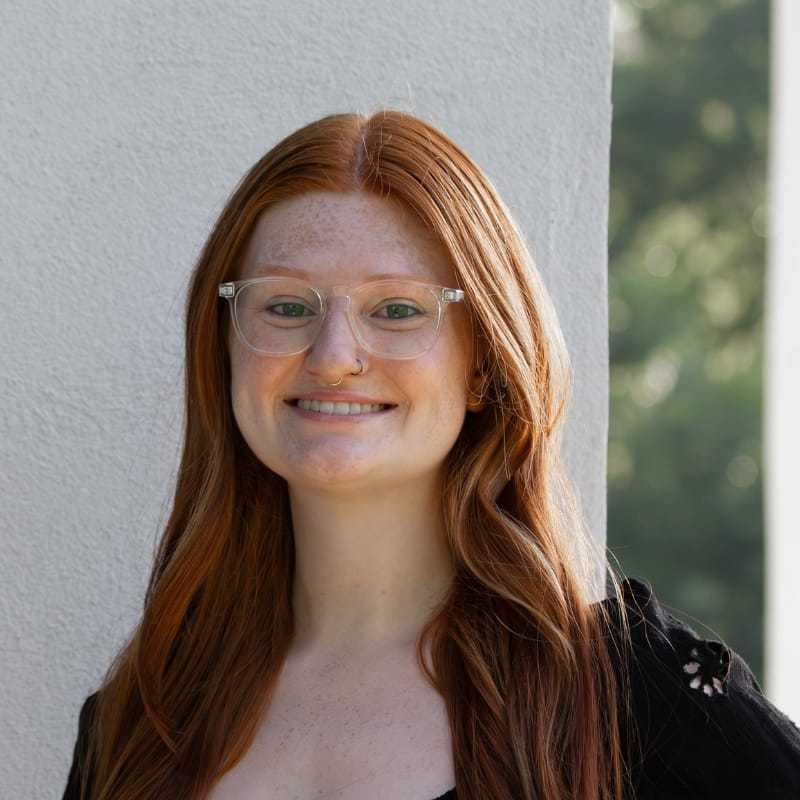 Portrait of Lexi J., a professional stylist at First Impressions Salon & Spa, showcasing their expertise and style.