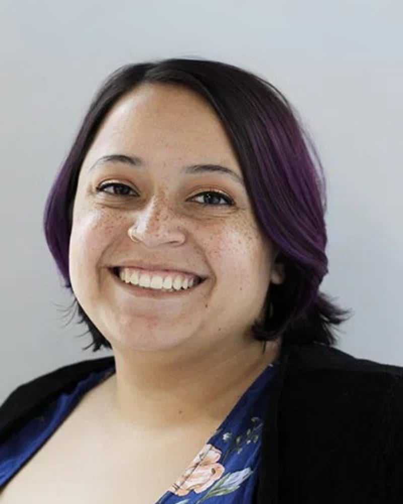 Portrait of Katie B., a professional stylist at First Impressions Salon & Spa, showcasing their expertise and style.