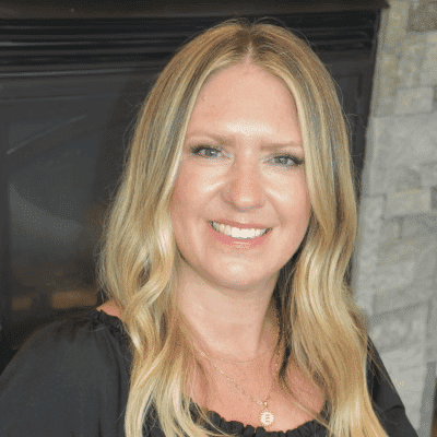 Portrait of Emilee S., a professional stylist at First Impressions Salon & Spa, showcasing their expertise and style.