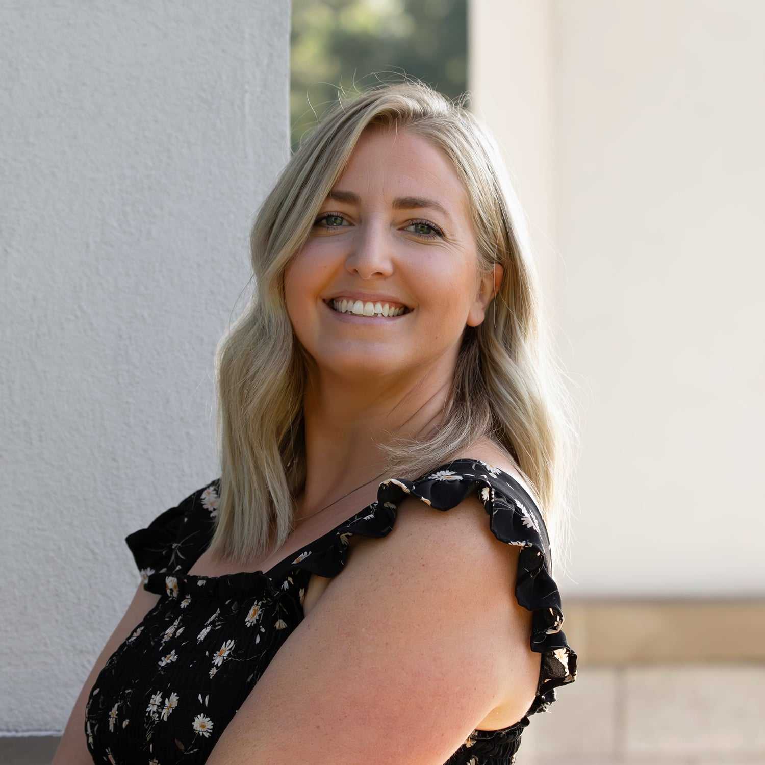 Portrait of Sydney V., a professional stylist at First Impressions Salon & Spa, showcasing their expertise and style.