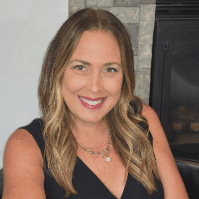 Portrait of Heaven G., a professional stylist at First Impressions Salon & Spa, showcasing their expertise and style.