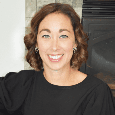 Portrait of Sarah T., a professional stylist at First Impressions Salon & Spa, showcasing their expertise and style.