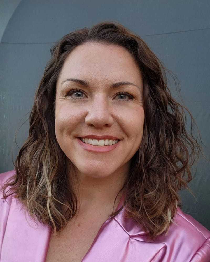 Portrait of Jill R., a professional stylist at First Impressions Salon & Spa, showcasing their expertise and style.