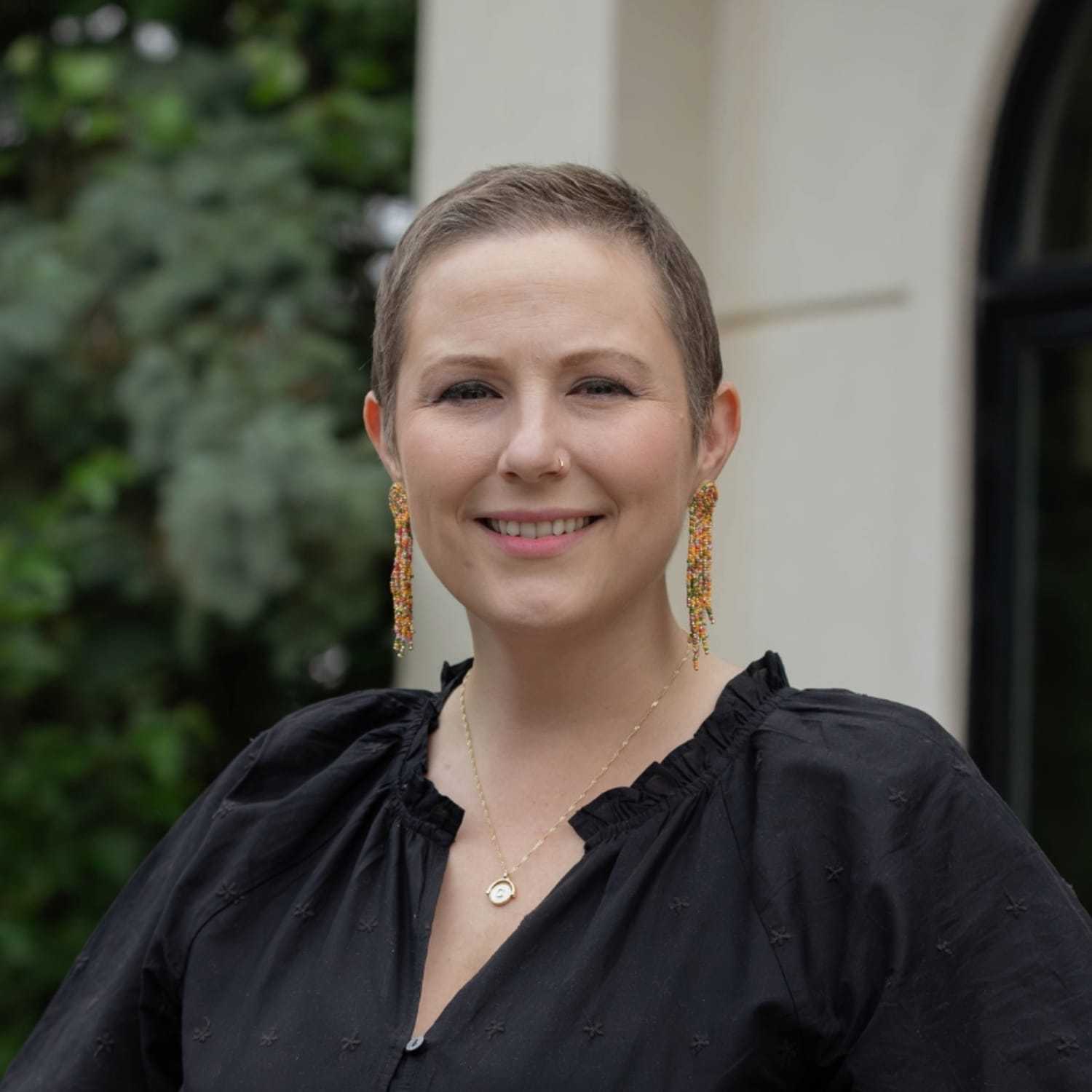 Portrait of Stephanie P., a professional stylist at First Impressions Salon & Spa, showcasing their expertise and style.