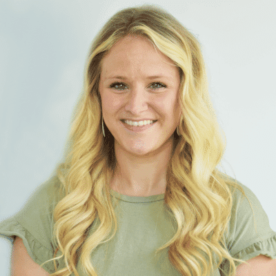 Portrait of Danielle A., a professional stylist at First Impressions Salon & Spa, showcasing their expertise and style.