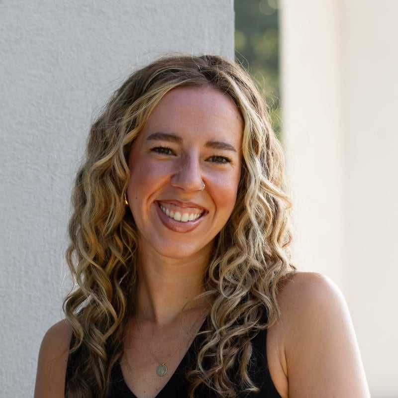 Portrait of Stacy G, a professional stylist at First Impressions Salon & Spa, showcasing their expertise and style.