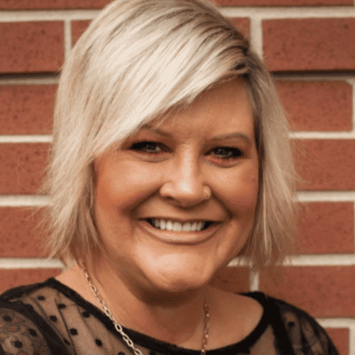 Portrait of Amy O., a professional stylist at First Impressions Salon & Spa, showcasing their expertise and style.