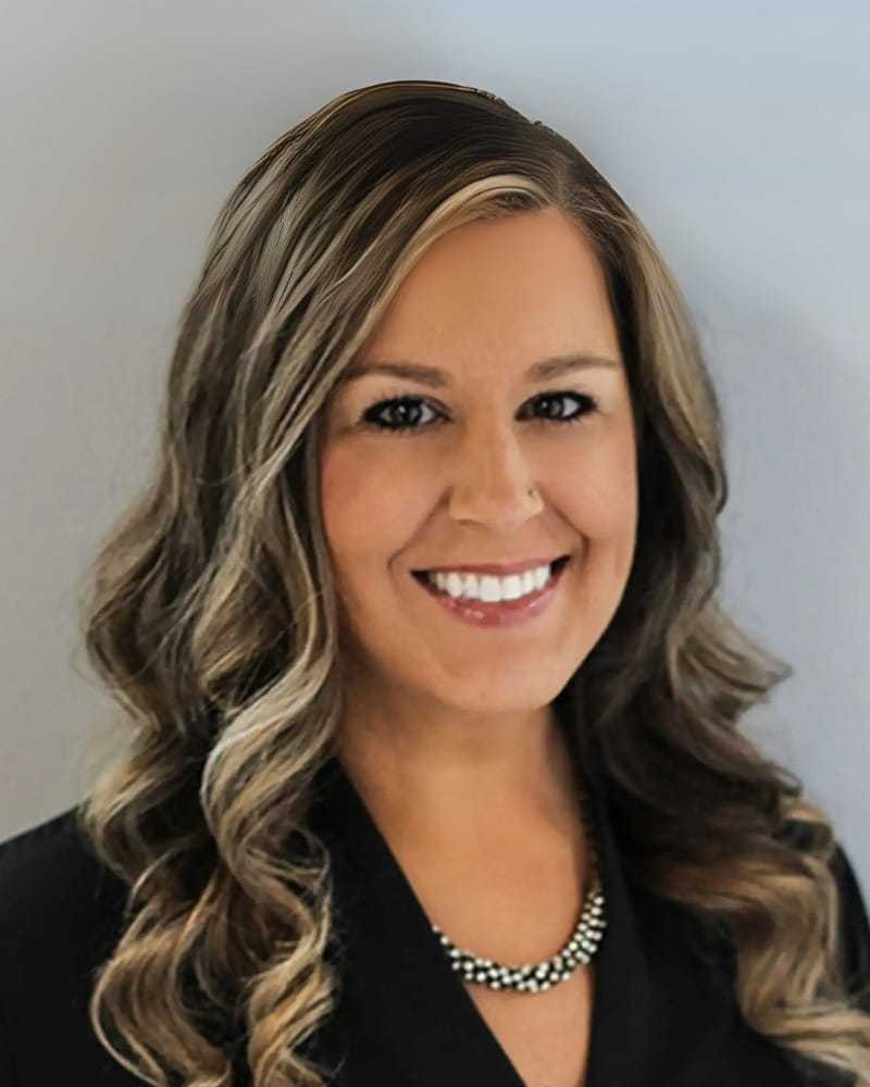 Portrait of Haley P., a professional stylist at First Impressions Salon & Spa, showcasing their expertise and style.